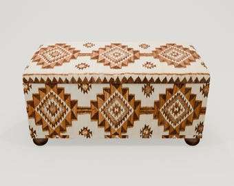 May include: A white storage bench with a brown and white geometric pattern. The bench has a rectangular shape and wooden legs.