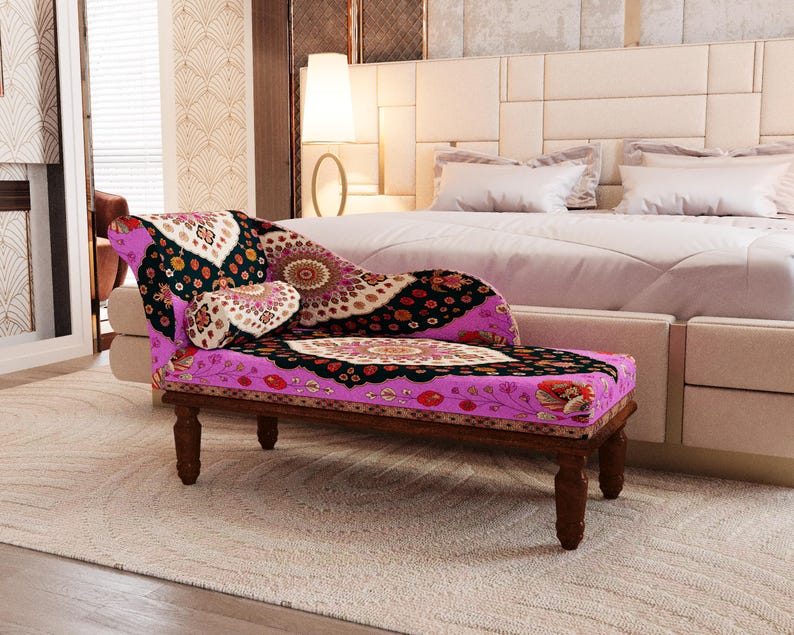 a bedroom with a large bed and a colorful, patterned chair in the foreground.