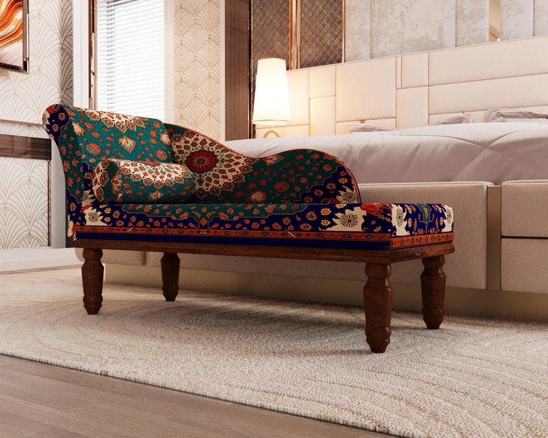 a modern and stylish bedroom with a large bed, a colorful patterned chair, and a white headboard.