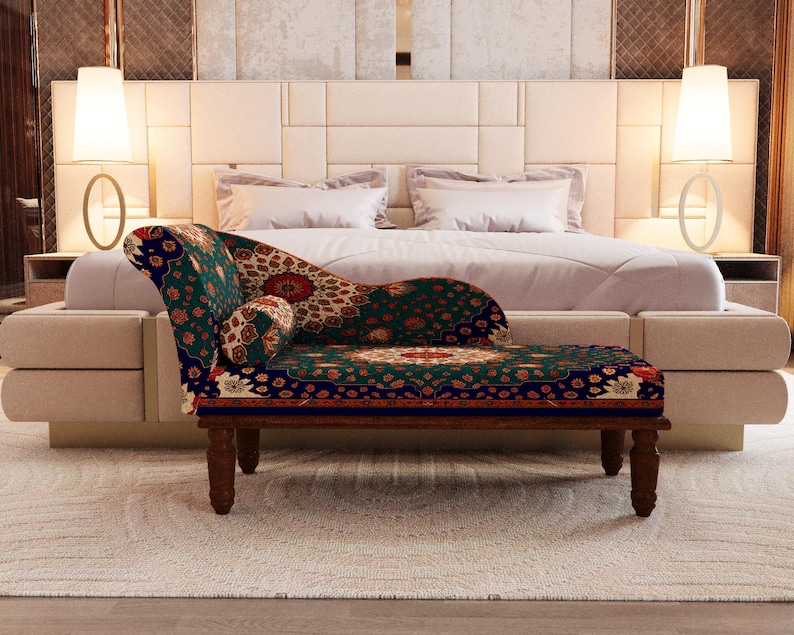 a luxurious bedroom with a large bed, a patterned armchair, and two floor lamps on either side of the bed.