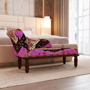 a modern bedroom with a large bed, a colorful patterned armchair, and a large window with curtains.