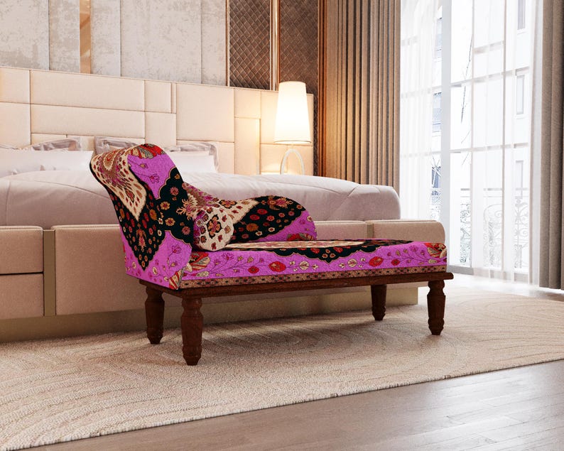a modern bedroom with a large bed, a colorful patterned armchair, and a large window with curtains.