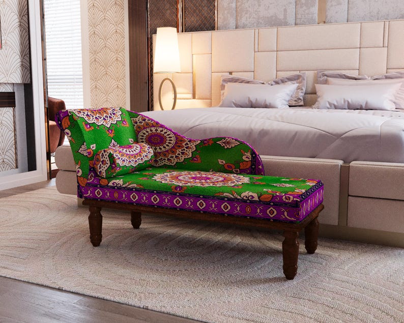 a bedroom with a large bed and a colorful, patterned bench or ottoman in the foreground.