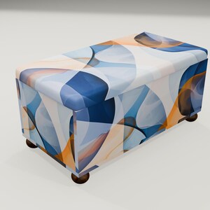 May include: A blue, orange, and white patterned storage ottoman with four wooden legs.