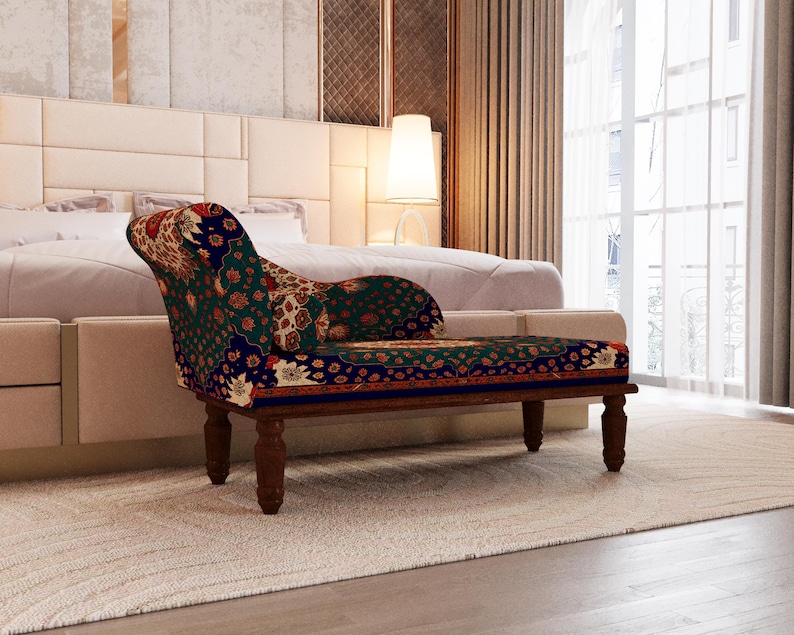 a modern bedroom with a large bed, a colorful patterned armchair, and a window with curtains.