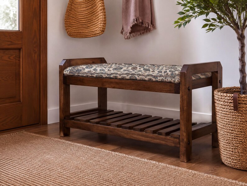 a wooden bench with a woven seat and a wooden shelf underneath, placed in a room with a woven basket and a potted plant.