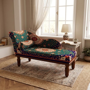 a cozy living room with a vibrant, patterned chair and a wooden side table with a lamp. The room has a large window that allows natural light to fill the space, and a rug on the floor adds warmth and texture to the room.