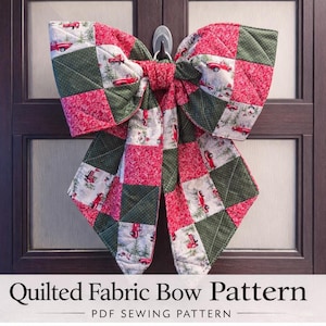 May include: A large, quilted fabric bow in red, green, and white, hanging on a door. The bow is made of patchwork squares with a Christmas truck pattern. The text at the bottom reads "Quilted Fabric Bow Pattern - PDF Sewing Pattern."