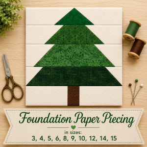 May include: A square quilt block featuring a green fabric Christmas tree design on a cream background. Below, a banner displays the text "Foundation Paper Piecing" with sizes 3, 4, 5, 6, 8, 9, 10, 12, 14, 15. Includes scissors, thread spools, and pins.