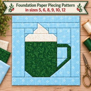 May include: A foundation paper piecing pattern featuring a mug graphic with a green leaf print, a white whipped topping, and a light blue background with white snowflake accents. The text reads Foundation Paper Piecing Pattern in sizes 5, 6, 8, 9, 10, 12.