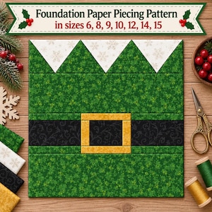 Könnte beinhalten: Ein Foundation-Paper-Piecing-Schnittmuster mit einem grünen Elfen-Tunika-Design, einem schwarzen Gürtel und einer goldenen Schnalle. Der obere Rand hat weiße, dreieckige Kragenspitzen mit Schneeflockenmuster. Der Text lautet: Foundation Paper Piecing Pattern in sizes 6, 8, 9, 10, 12, 14, 15.