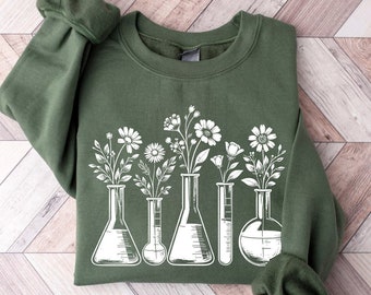 Sleek Botanical Beaker Sweatshirt | Science Teacher Crewneck | Floral Chemistry Lab Shirt | Lab Technician Gifts | Biology Fashion Sweater