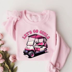 女性ゴルファーのための Let's Go Girls ピンク ゴルフカート セーター | 女性用ゴルフ スウェットシャツ | ゴルフ バチェロレッテ パーティー | ゴルフガール | 女性用ゴルフギフト