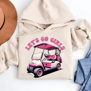 女性ゴルファーのための Let's Go Girls ピンク ゴルフカート パーカー | 女性用ゴルフ パーカー | ゴルフ バチェロレッテ パーティー | ゴルフガール | 女性用ゴルフギフト