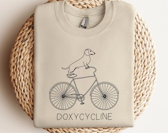 Doxycycline Pharmacy Pun Sweatshirt | Dachshund on Bicycle | Pharmacists Shirt | Veterinary | Pharmacy Gift | Pharmacists & Technicians Gift