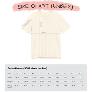 May include: Cream-coloured unisex t-shirt with a size chart. The chart, labelled "Bella+Canvas 3001 sizes (inches)," details measurements for XS to 5XL sizes, including width, length, and sleeve length in inches. The text "SIZE CHART (UNISEX)" is at the top.