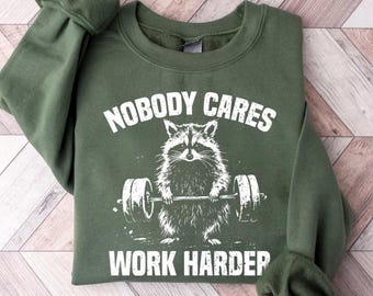 Nobody Cares Work Harder Sweatshirt | Funny Raccoon Gym Pullover | Barbell Fitness Motivation Shirt | Funny Powerlifting Sweater