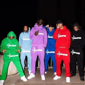 Pink nike tech sweatsuit new arrivals