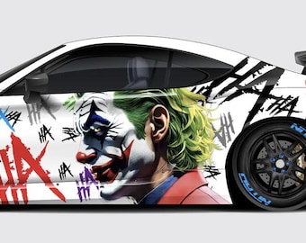 May include: A white car with a Joker graphic on the side. The graphic is in black, red, green, and blue. The car has black wheels with blue accents. The car has the word "HA" written on the side multiple times.