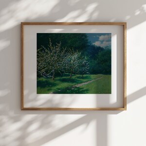 May include: A framed painting of a landscape with two trees in bloom. The trees are in the foreground, with a path leading to a forest in the background. The sky is blue with white clouds.