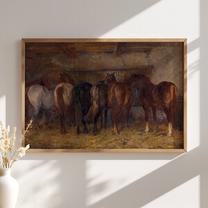 May include: A vintage oil painting depicting a group of horses in a stable. The horses are brown, black, and white, and they are standing in a row, facing the viewer. The stable is dimly lit, and the horses are casting long shadows on the floor.