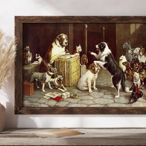 May include: A framed vintage print depicts a gathering of various dog breeds in a room. A black and white Border Collie stands on its hind legs, interacting with a seated dog. Other dogs are seated or standing around a wooden crate.