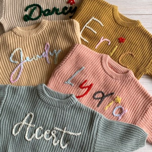 Personalized custom baby sweaters: hand embroidered with love and care! Celebrate their names with adorable embroidery!