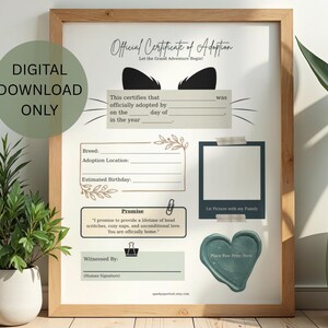 May include: A framed "Official Certificate of Adoption" print with a wooden frame. The certificate includes spaces to fill in details like breed, adoption location, and estimated birthday. A green heart-shaped paw print seal is at the bottom.