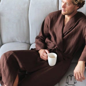 May include: A brown linen robe with a matching belt is worn while seated on a gray sofa. The robe is open, revealing the chest. A white mug is held in the lap. The image includes the text "Stuff Kurta" and a graphic.