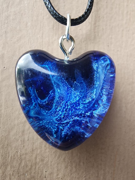 Handcrafted Resin Heart Pendant Necklace – A beautiful unique accessory, this heart pendant necklace adds a touch of elegance to any outfit.