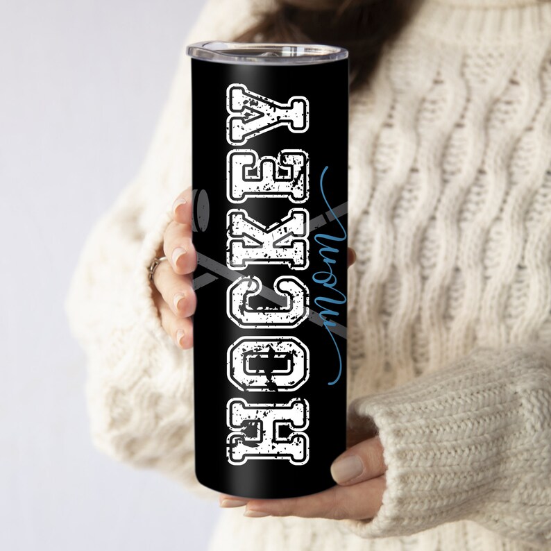 May include: Black stainless steel tumbler with a white distressed graphic that says "Hockey Mom".