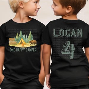 two young boys standing next to each other