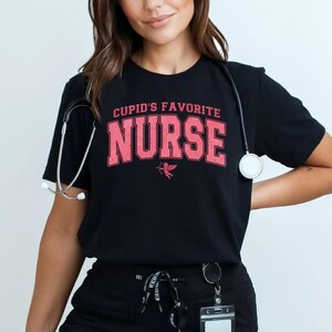 a woman in a black shirt with a stethoscope around her neck