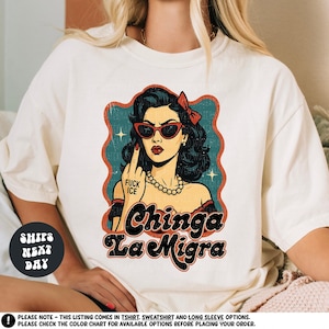 a woman wearing a t - shirt with a picture of a woman wearing sunglasses