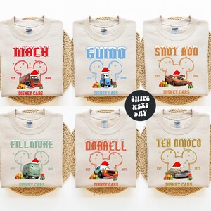 six t-shirts with Disney Cars designs, featuring various characters and vehicles from the animated series.