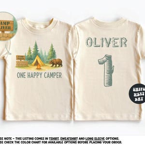 a t - shirt with an image of a camper and a bear on it