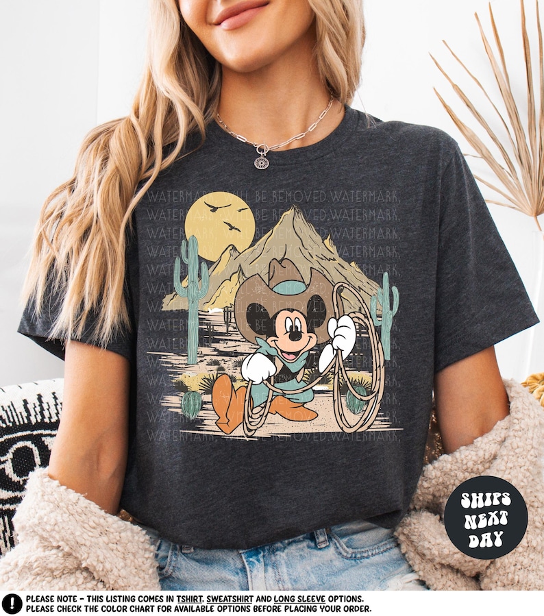 a woman wearing a mickey mouse t - shirt