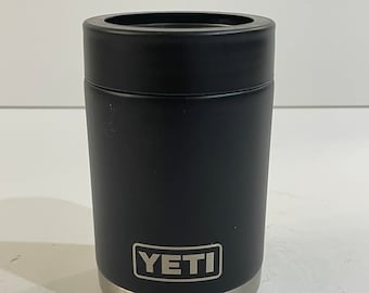 Yeti Rambler Colster Black and Stainless Steel bottle or can holder.