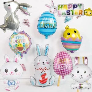 May include: A set of Easter-themed foil balloons featuring bunnies, eggs, and the phrase "Happy Easter". The balloons are in various colors, including pink, blue, yellow, and white.