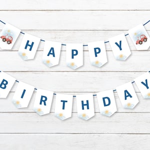May include: White banner with blue letters spelling "Happy Birthday" with a red car illustration on each end. The banner is strung on a blue cord and has a white background with a yellow sun and blue clouds.