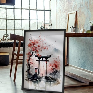 May include: A framed watercolor painting of a traditional Japanese gate, or torii, with cherry blossoms and a mountain in the background. The painting is in a black frame and is hanging on a wall.