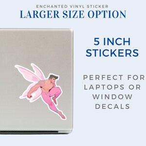 May include: A 5 inch vinyl sticker featuring a pink fairy with a muscular, bare-chested male body. The fairy is flying with wings spread and has a determined expression. The sticker is perfect for laptops or windows.