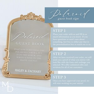 A gold wedding mirror being used as decoration for a wedding entrance table that has a polaroid guest book on it, with the wedding mirror having custom vinyl decal words on it that prompt wedding guests to leave a polaroid and a message as an alternative wedding guest book ideas.