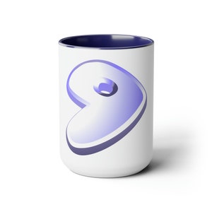 May include: White ceramic mug with a blue interior and a large, stylized number nine in shades of purple. The number has a glossy, three-dimensional appearance, set against a clean white background.