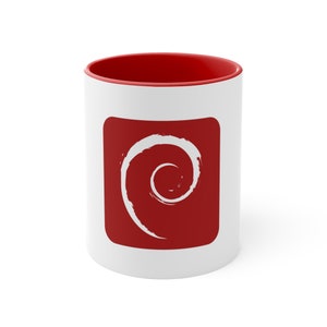 May include: White ceramic mug with a red rim and a red square with a white spiral logo in the centre.