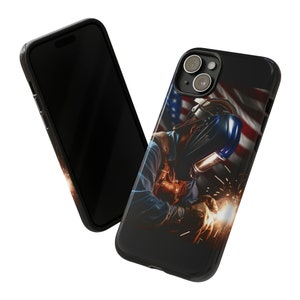May include: A black phone case with a welder wearing a welding mask and a US flag in the background. The case has a camera cutout and a black border.