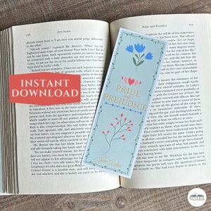 May include: A bookmark featuring a light blue background with a floral design of pink and blue flowers and green leaves. The bookmark has the title "Pride and Prejudice" in white text with a decorative heart design. The bookmark is by Jane Austen.