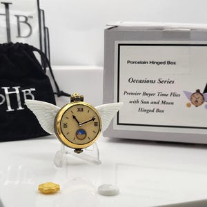 Time Flies porcelain hinged box with sun and moon trinkets. Made by Midwest of Cannon Falls.