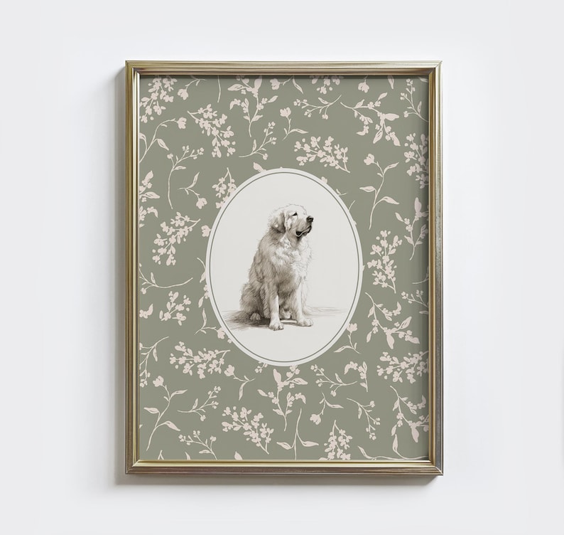 May include: Framed print with a detailed illustration of a white dog in an oval frame. The background is sage green with a delicate floral pattern. The frame has a gold tone.