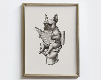 May include: Framed black and white illustration of a French Bulldog reading a newspaper whilst sitting on a toilet. The artwork is in a gold frame and is a humorous depiction of a dog.